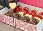 a box of heart shaped macarons
